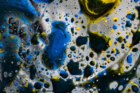 Colored abstract background.Ink Bubbles In Water. Abstract colorful paint.の写真素材