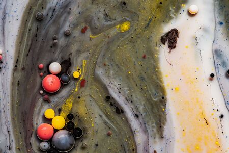 Bright colorful acrylic paint. Macro structure of Multicolored Bubbles Paint and Oil.の写真素材
