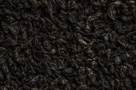 Texture of tea. Dry black tea leaves.の写真素材
