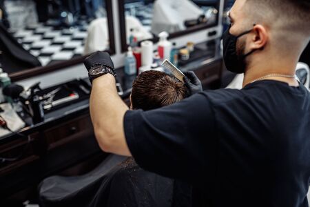 Haircut in new conditions. News in the world of fashion.の写真素材