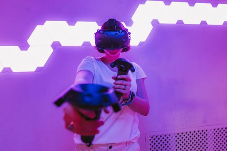 The girl joins virtual reality. VR gamesの写真素材