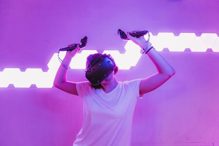 The girl joins virtual reality. VR gamesの写真素材