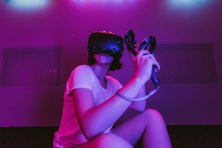 The girl joins virtual reality. VR gamesの写真素材