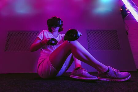 The girl joins virtual reality. VR gamesの写真素材