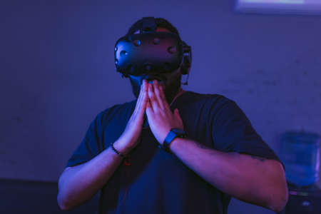 Augmented reality. Man surprised in Vr helmet.の写真素材