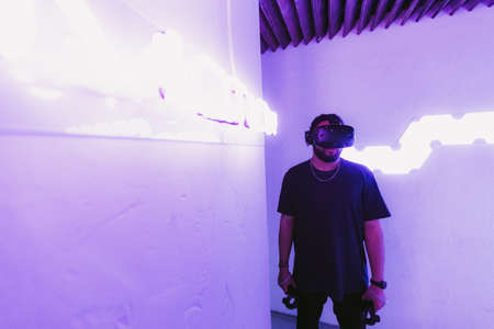 Mixed Reality MR . Man is connected to digital reality. Cyber room.の写真素材