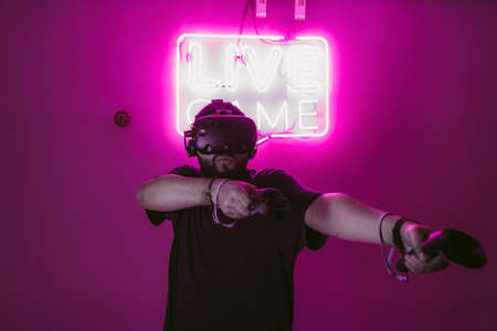 Live games in virtual reality. The guy in the game outfit.の写真素材
