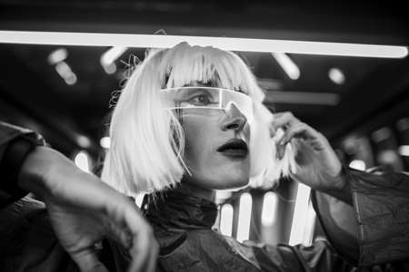 Female futuristic portrait. Woman in cyber glasses.の写真素材