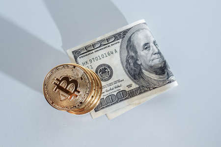 Bitcoin and dollars. The new currency of the future.の写真素材