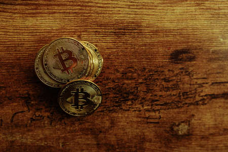 Bitcoins on a wooden background.の写真素材