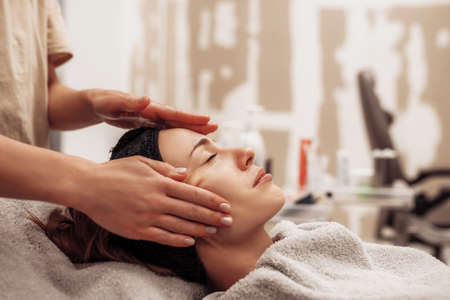 The woman is massaged face and body.の写真素材