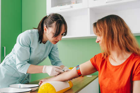 Blood collection from a patient. Passing tests.の写真素材