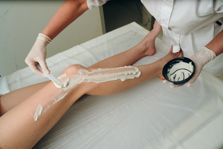 A woman receives a foot massage with peeling.の写真素材