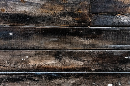 Close-up of rustic wooden planks with natural textures and weatheringの写真素材