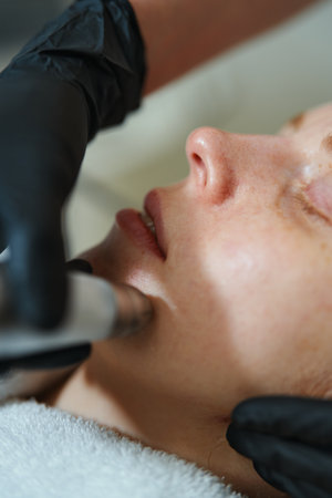 Facial treatment session at a beauty salon in the afternoonの写真素材