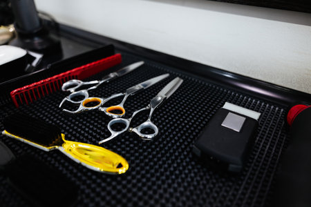 Hair salon tools laid out on a workstation during a busy day