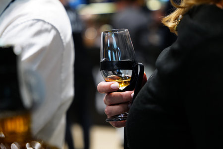 Elegant gathering featuring a cocktail in stylish surroundings with ambianceの写真素材