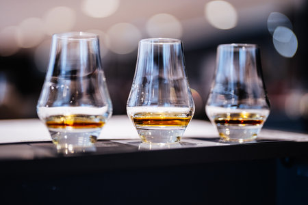 Savoring the nuances of fine spirits during a tasting experienceの写真素材