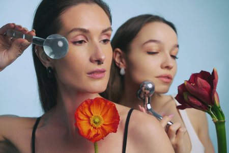 Beauty routine with flowers and unique skincare tools in modern setting