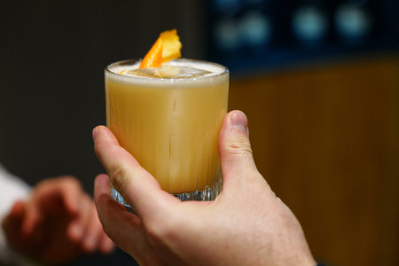Refreshing cocktail served with a citrus garnish for an evening gathering