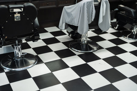 Stylish barbershop interior with classic black and white design elementsの写真素材