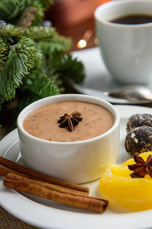 Plum pudding with a hint of orange with spicy date truffles, 45 degree angleの写真素材
