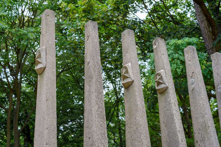 Poznan, wielkopolskie, Poland, 06.07.2019: close-up of an aisle with stars emblems next to the 'Brotherhood in arms' monument in the Cytadela park, Poznan, Polandのeditorial素材