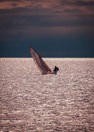 sneaking boat on the lakeの写真素材