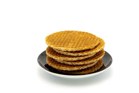 cookies on plate isolated on white backgroundの写真素材