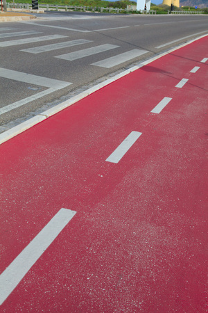 Red bicycle pathの写真素材