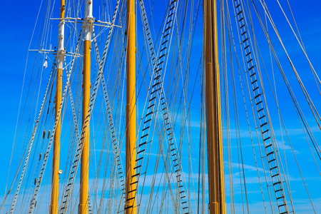 Yacht mast against blue summer skyの写真素材