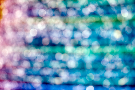 Blurred shining colorful fountain background