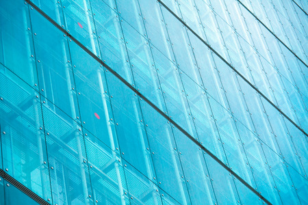 Modern glass silhouettes on modern building
