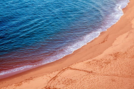 Wave on the sand beach background