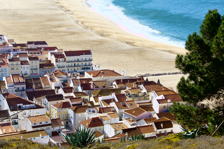 View on Nazare beach  on the coast of Atlantic ocean . Portugal .のeditorial素材