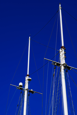 yacht mast on blue sky background