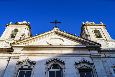 Close up particulare of facade of the church  in Lisbon . Blue sky backgroundの写真素材