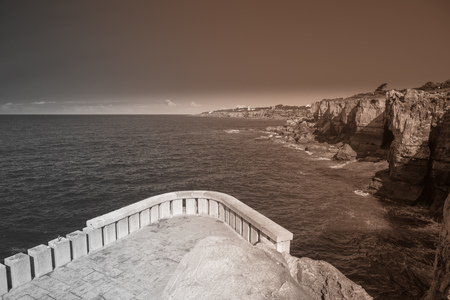 Rocky coast line .  view sea rocky coast, waves breaking to the rocky shore. Sea landscape