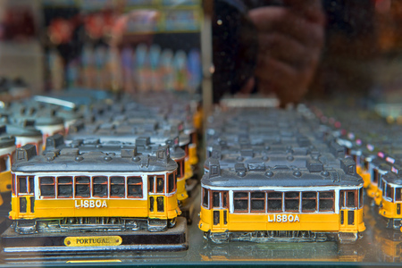 LISBON - APRIL 01 , 2018 : Typical Portuguese souvenirs are presented on a show-window for involvement of buyersのeditorial素材