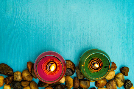Beautiful composition with burning candles on wooden background
