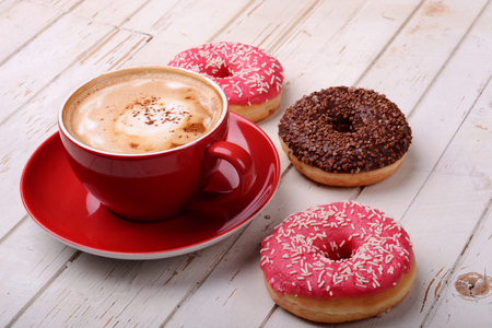 Cup of coffee and donutsの写真素材