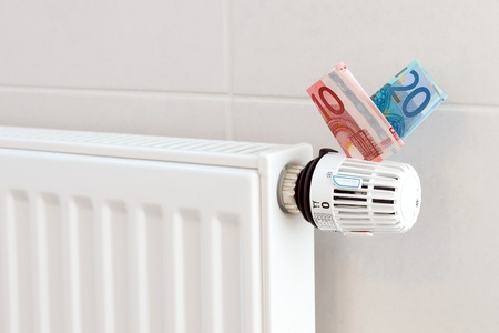 Heating thermostat with euros, expensive heating conceptの写真素材
