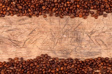 Coffee bean border on wooden background, concept
の写真素材