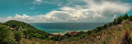 View of the Sea, the island green and the sky with large clouds.の写真素材