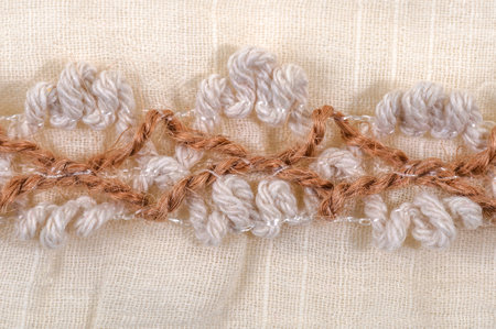 Structure of a fabric of a sacking with an ornament from a cordの写真素材