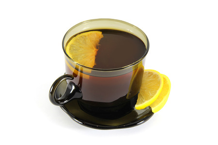 hot drink with a lemon, isolated on white backgroundの写真素材