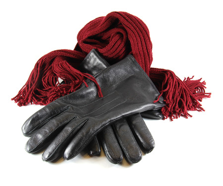 Men's black leather gloves isolated on white backgroundの写真素材