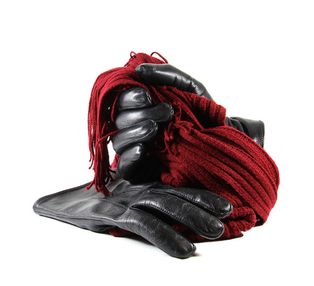 Men's black leather gloves isolated on white backgroundの写真素材