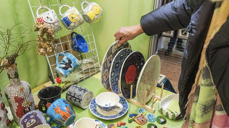 Rustic kitchen dishes. Craft pottery. Environmentally friendly ceramic tableware.の写真素材