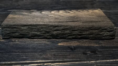 Realistic highly detalized dark wood background. Old wooden plank. Texture and abstract concept.の写真素材
